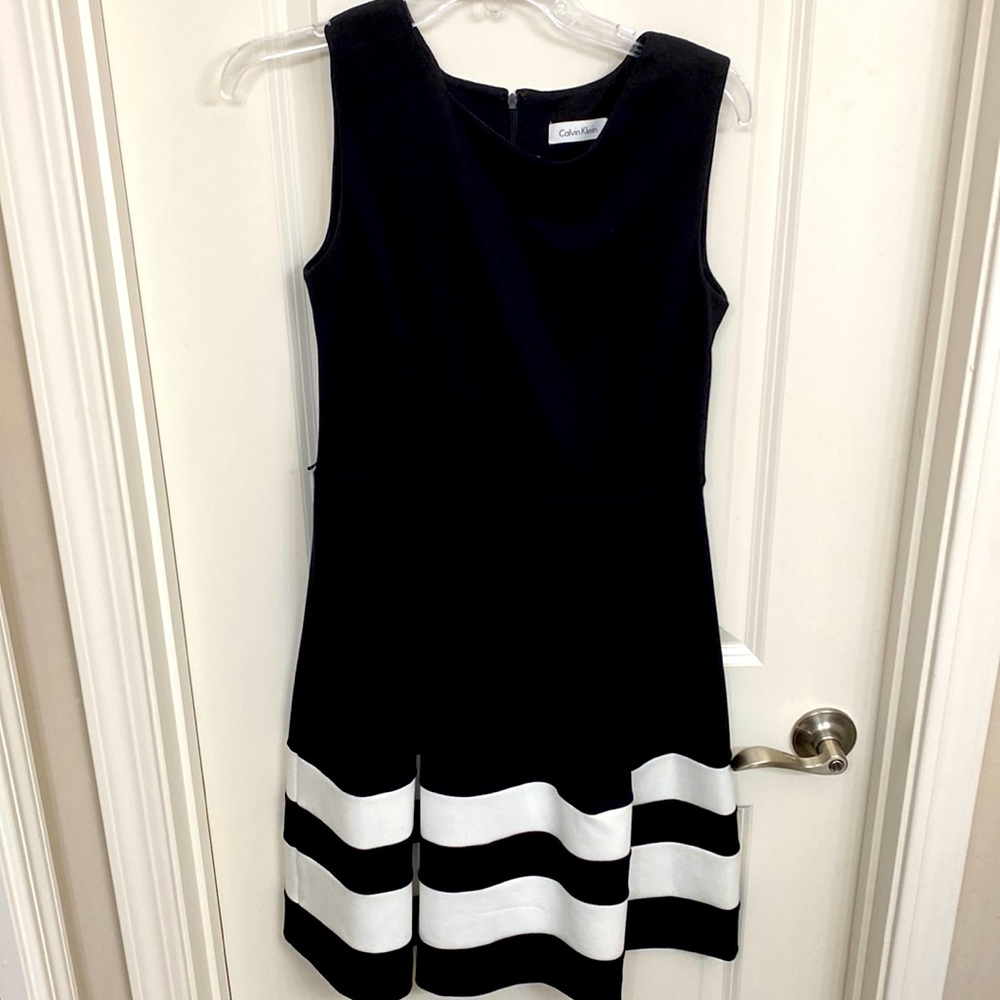 Calvin Klein size for black dress with white stripes at bottom nwot no belt